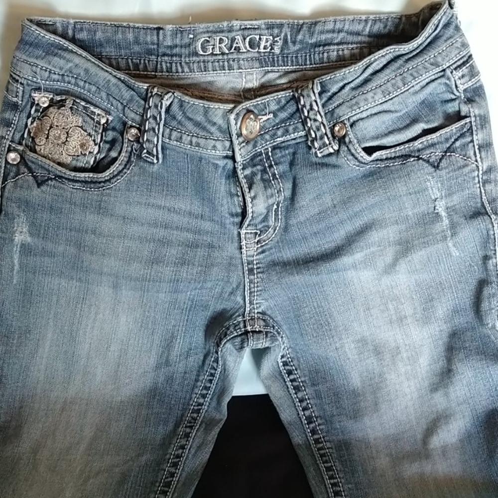Acid washed, distressed Grace La jeans Boot cut